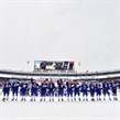 BUFFALO, NEW YORK - DECEMBER 29: USA players salute the crowd at New Era Field after the national anthem prior to preliminary round action against Canada at the 2018 IIHF World Junior Championship. (Photo by Matt Zambonin/HHOF-IIHF Images)


